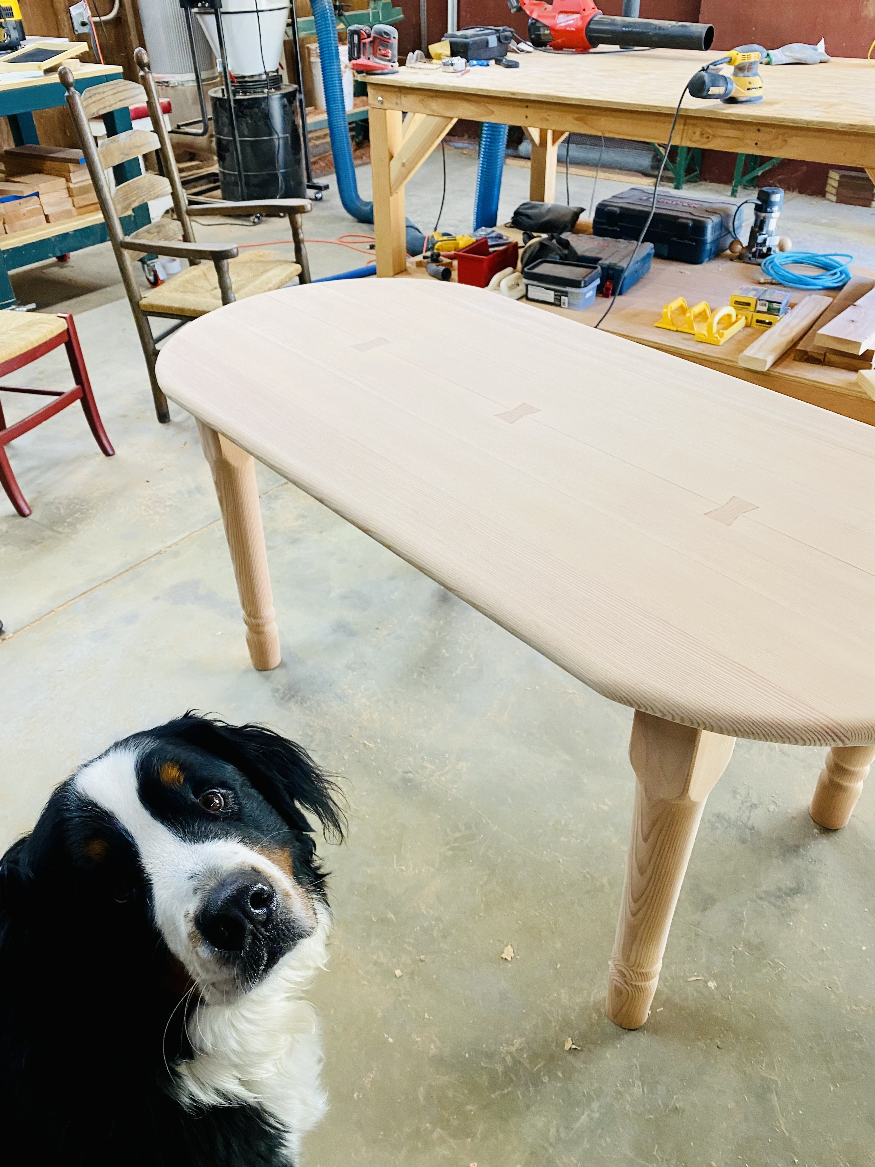 Rounded table with bowtie inlays